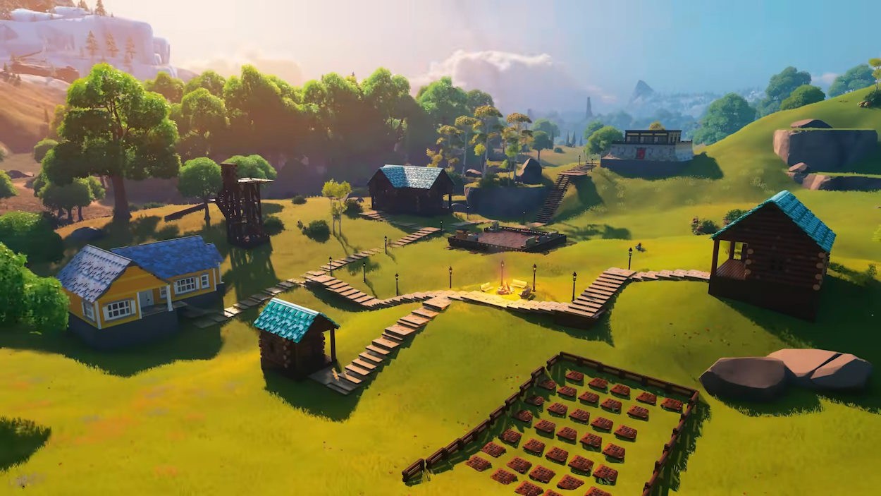 Ban ngày trong LEGO Fortnite với hình ảnh một ngôi làng nhỏ và nhân vật đang làm việc