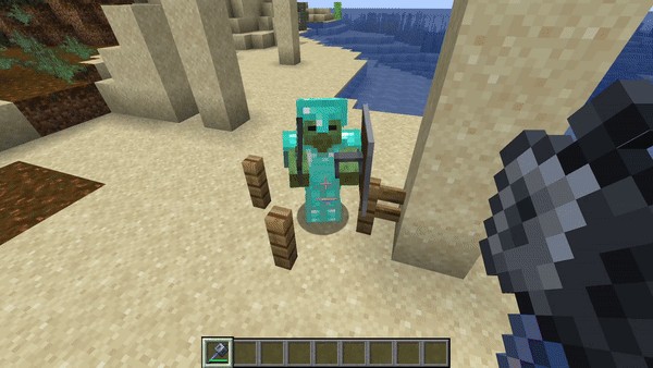 Chùy được phù phép Xuyên Giáp tiêu diệt một zombie kim cương trong Minecraft