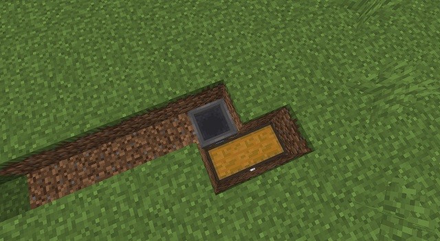 Khu vực thu gom vật phẩm của trang trại bí ngô trong Minecraft