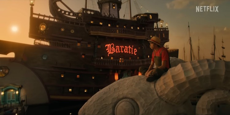 Luffy ngồi trên đỉnh Going Merry trước nhà hàng Baratie.